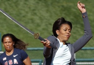 Michelle-Obama-Hitting-A-Tennis-Ball-3-595x412